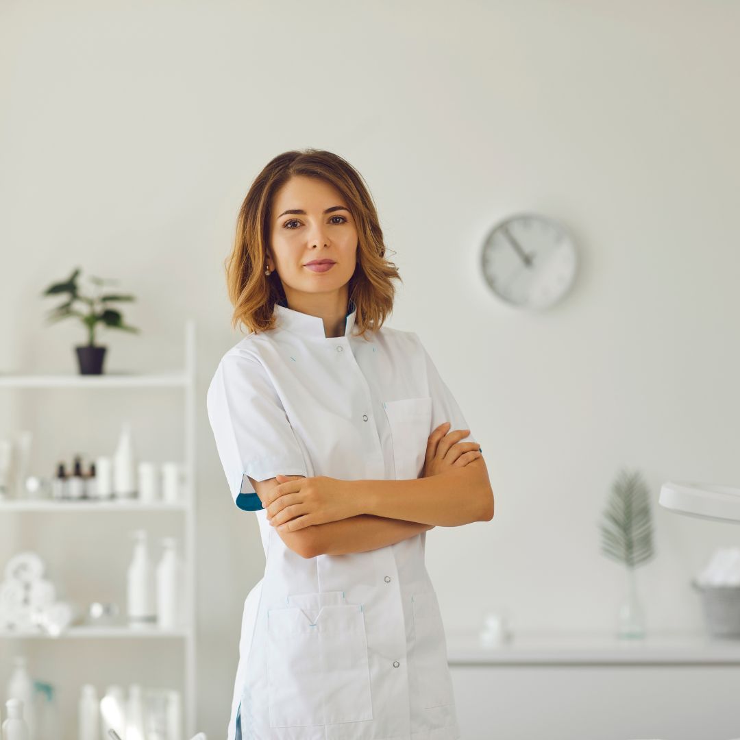 woman stands in med spa environment 