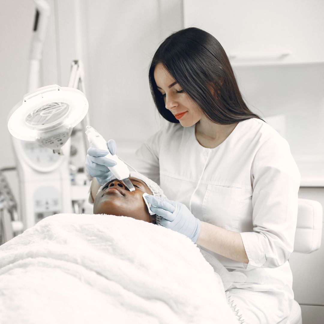 woman practicing Esthetician technique