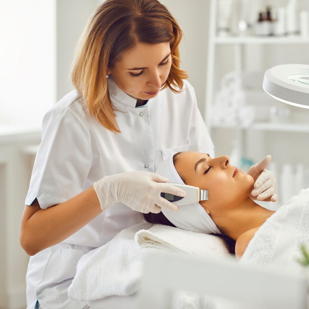 woman getting a microdermabrasion treatment