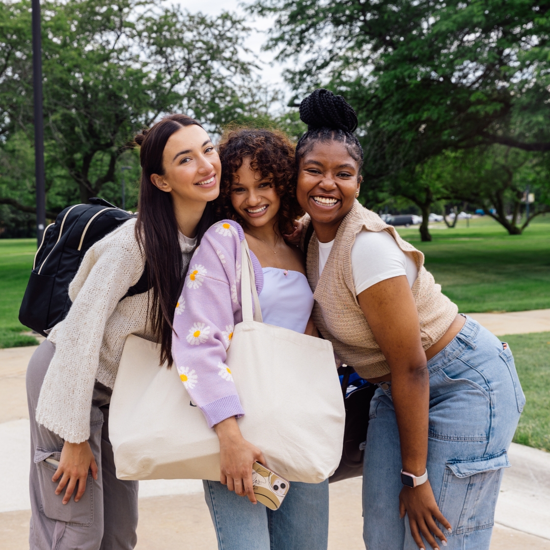 Three students posing for a photo